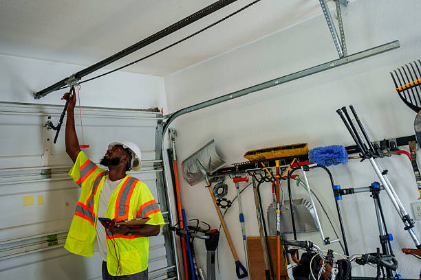 Professional Garage Door Panel Replacement technician working in West Hempstead, NY